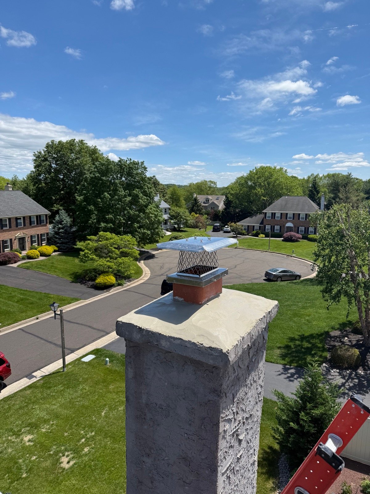Chimney with fresh waterproof coating and new cap